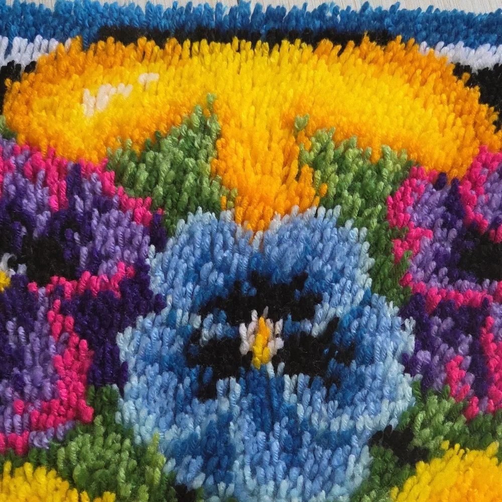 Completed Caron Wonderart Pot of Pansies Rug